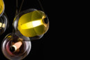 Brokis kapselt licht in in een cocon van (getint) glas